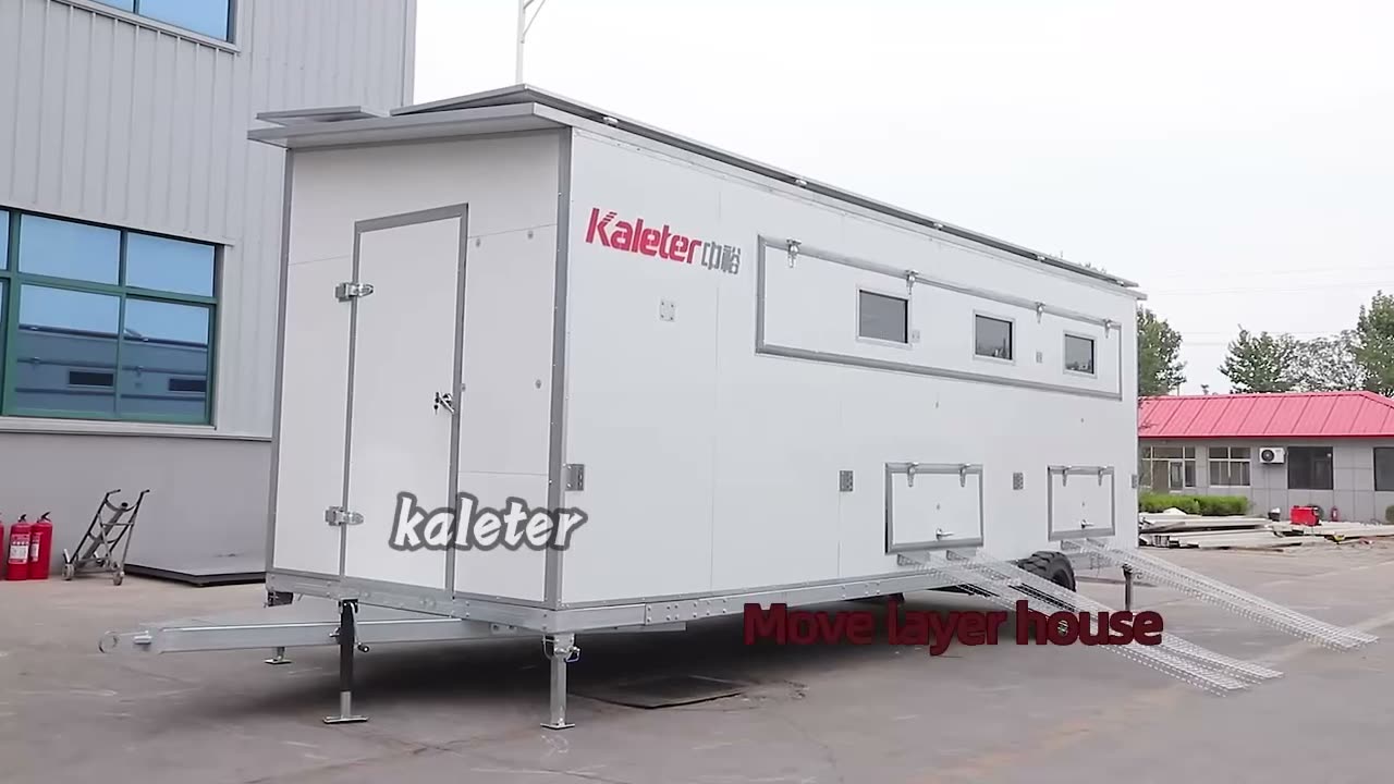 Compact self-contained layer house, outside and in, with drinker line and ventilation.
