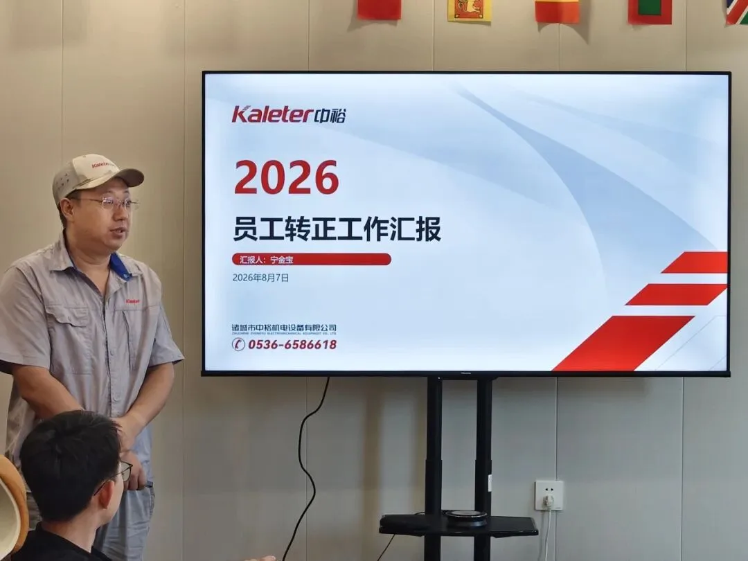 A new Kaleter employee presents his probation review presentation
