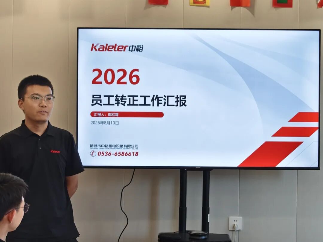 A new Kaleter employee presents his probation review presentation