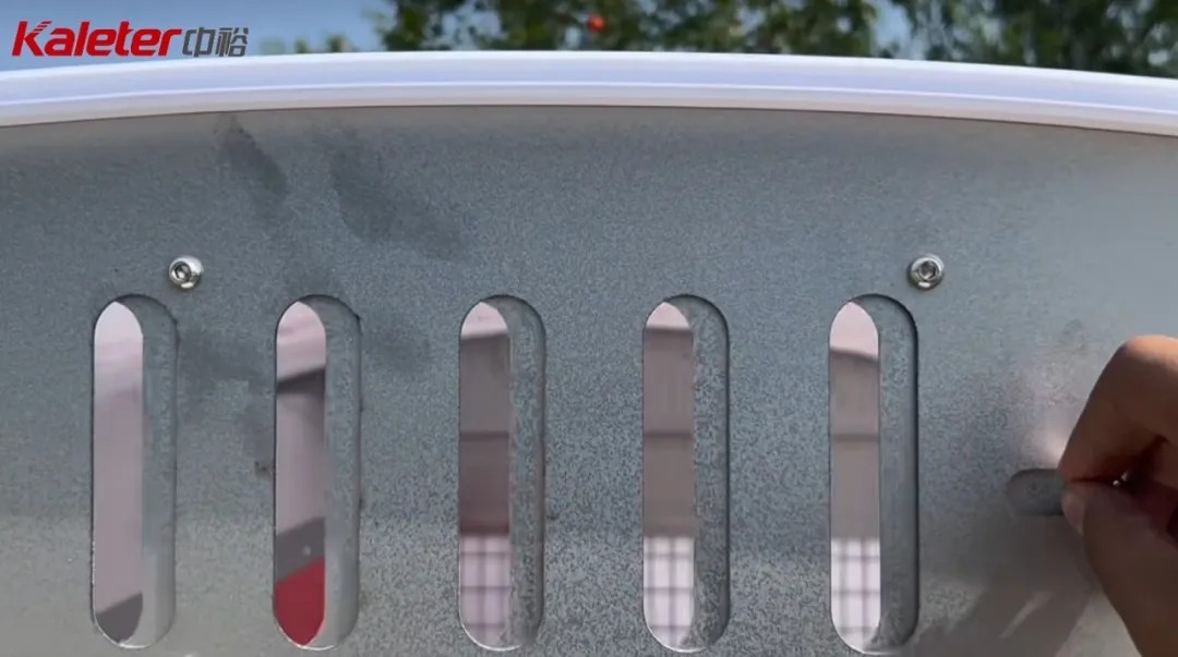 Close-up of the adjustable roof ventilation slots on the mobile chicken house