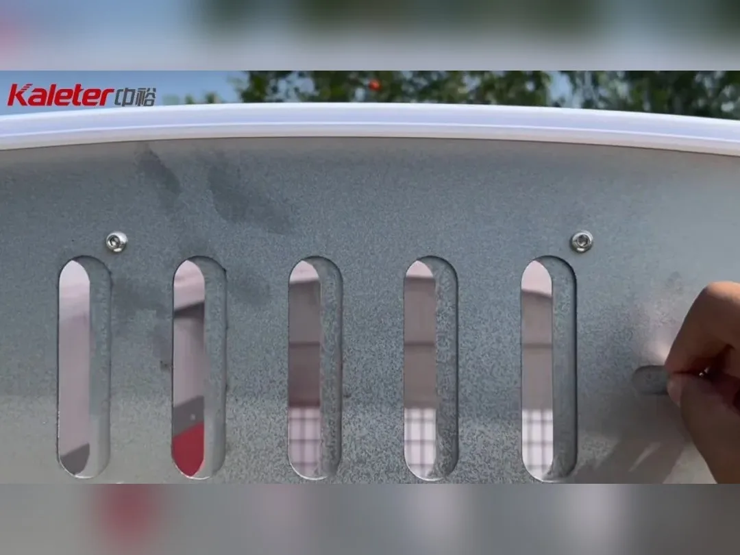 Close-up of the adjustable roof ventilation slots on the mobile chicken house