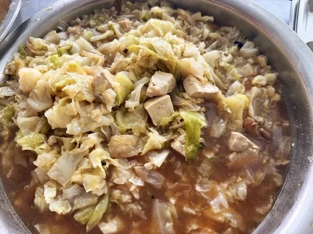 Stir-fried cabbage and tofu dish served at Kaleter's June birthday celebration