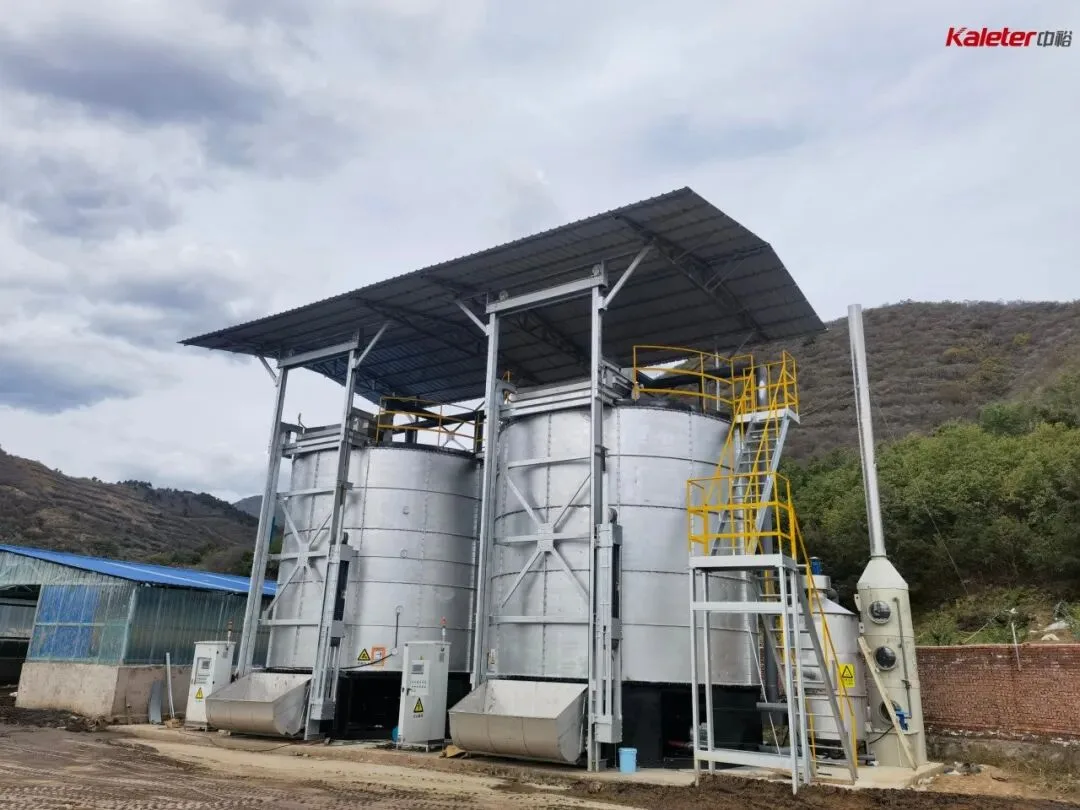 Kaleter fermentation tanks installed under a canopy at a farm