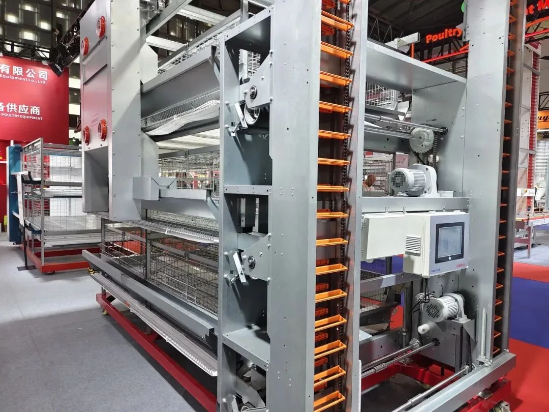 Kaleter layer cage system on display, showing the frame, egg belt and drive units